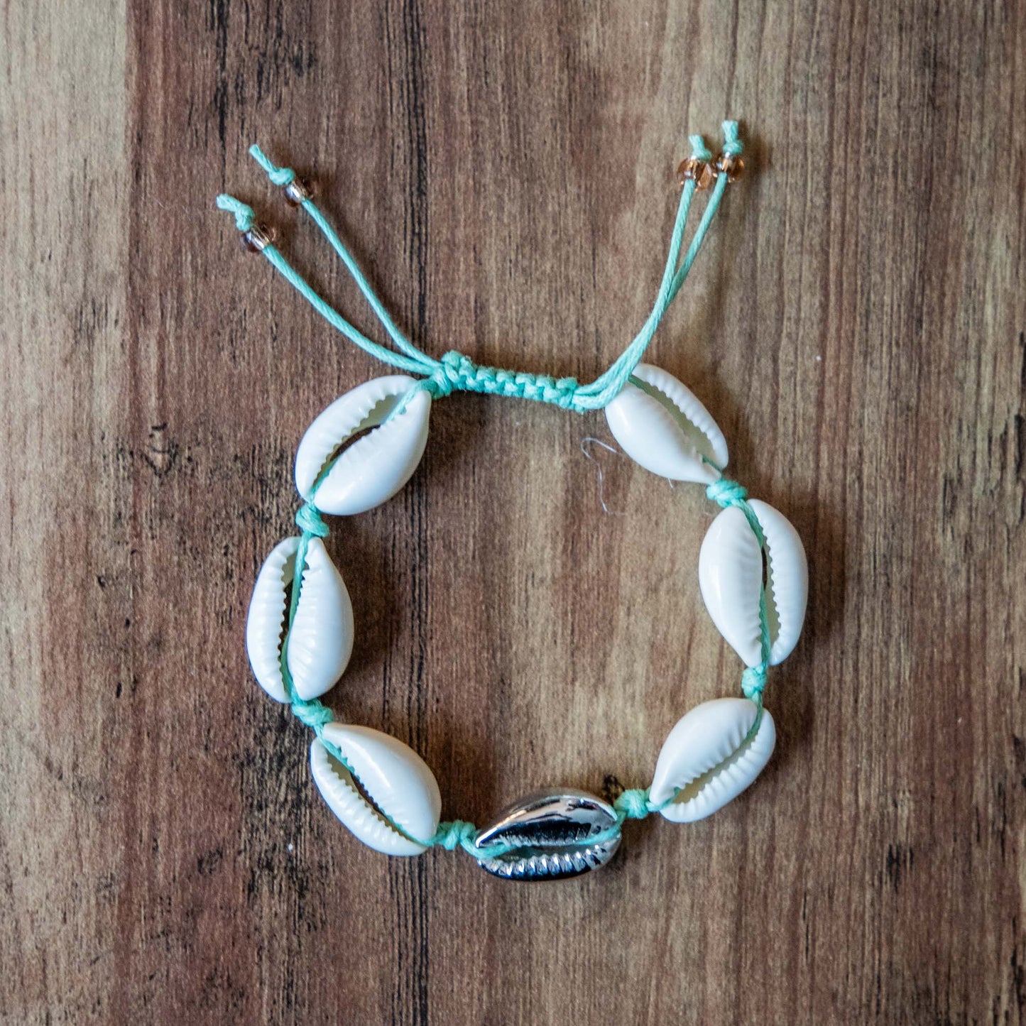Bracelet cauri vert d'eau